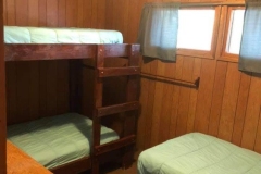 lake-of-the-woods-boat-in-fishing-cabin-bears-den